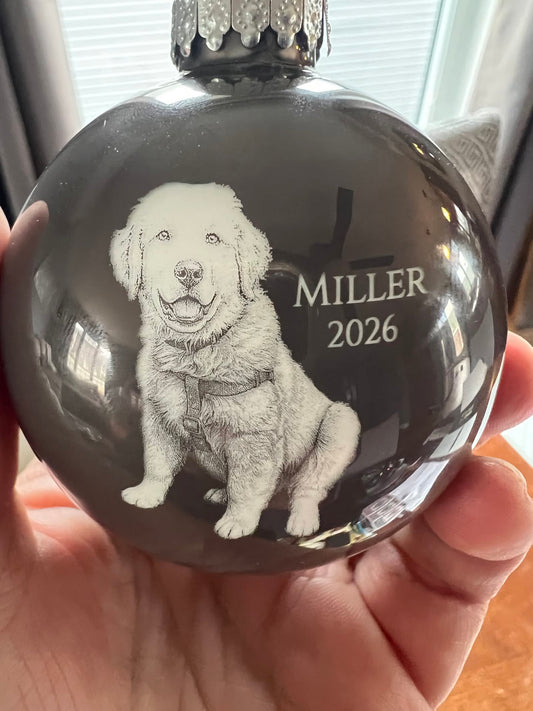 Personalized glass Christmas ornament engraved with a pet photo, name and year